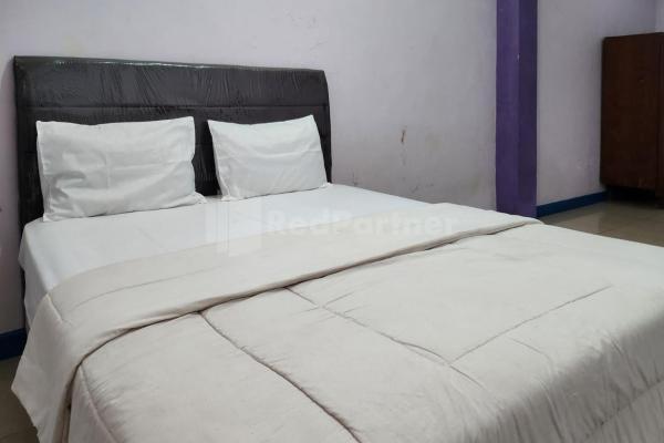 Nella foto è visibile l'oggetto Puspita Homestay Mitra RedDoorz situato nella città di Pangkalanuringin.