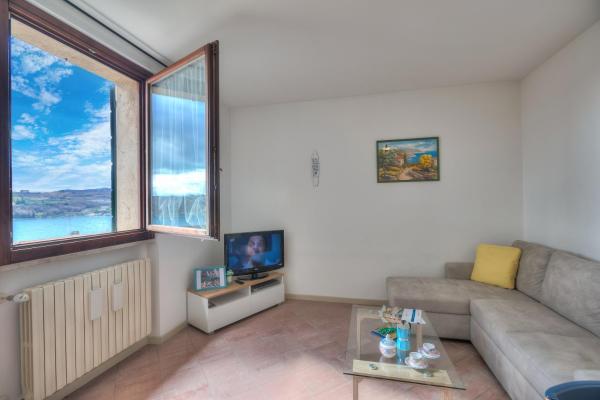 A la foto es mostra l'objecte Mirabella Lake View & private parking - Happy Rentals situat a la ciutat de Salò.