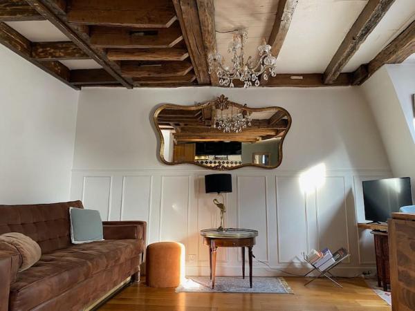 Foto 1: Central Duplex with Panoramic Views over Paris