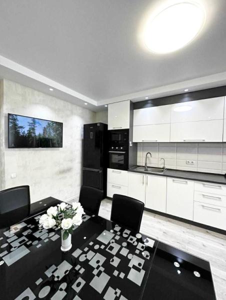 На фото показан объект Most City Area Pearl Apartment, расположенный в городе Днепр.