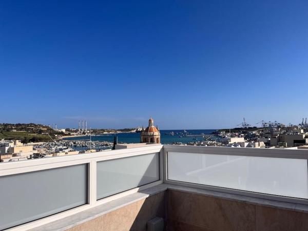 På billedet ses objektet Marsaxlokk 3 Bedroom Penthouse beliggende i byen Marsaxlokk.