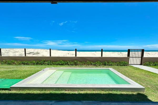 La photo montre l'objet Beachfront Duplex #A10 em Barro Preto by Carpediem situé dans la ville de Prainha.