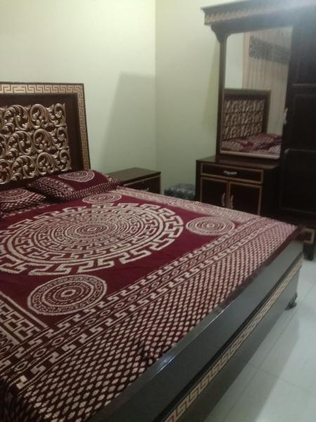 A la foto es mostra l'objecte Gujrat Guest House situat a la ciutat de Gujrāt.