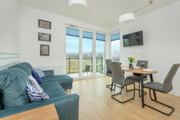 Auf dem Foto ist das Objekt Przy Plaży - Rodzinny Apartament z salą zabaw Puck by Noclegi Renters in der Stadt Puck zu sehen.