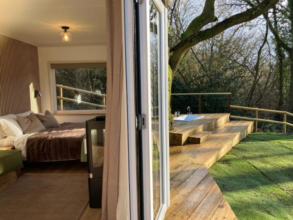 Na zdjęciu widoczny jest obiekt The Cabin in the Woods położony w mieście Romsey.