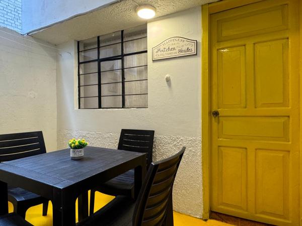 The photo shows the Yellow Door - 2 bedroom 1 bath located in the city of Baños.