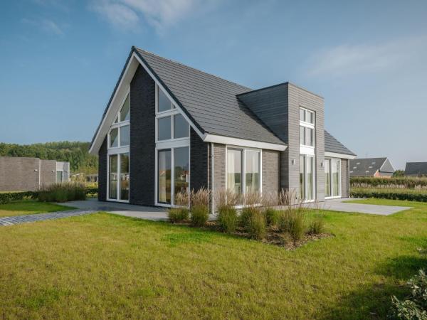 Na fotografii je vidět objekt Modern House by the Pond in Zeeland nacházející se ve městě Wemeldinge.