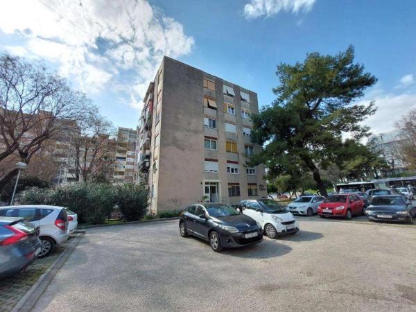The photo shows the Apartments with a parking space Split - 22919 located in the city of Split.