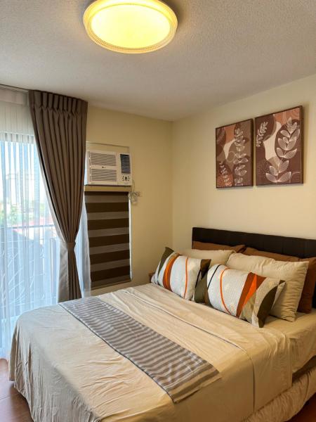 Resort-inspired Condo with Queen-size bed & 50-inch Smart TV, Cebu