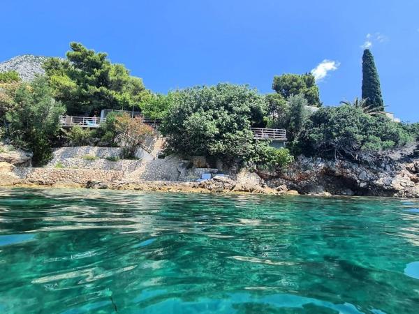 På bilden syns objektet Seaside holiday house Podaca, Makarska - 22964 som ligger i staden Podaca.