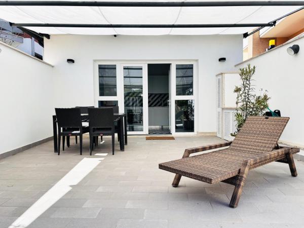Na fotografii je vidět objekt Maison Blue con Patio nacházející se ve městě Fregene.