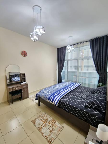 Na fotografii je vidět objekt HOLIDAY HOME in Ajman nacházející se ve městě Adžmán.