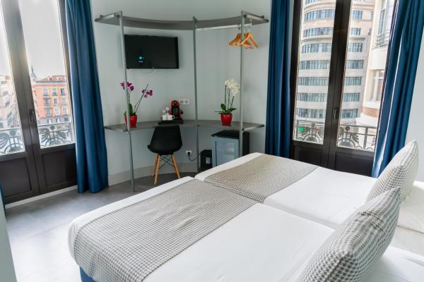 A la foto es mostra l'objecte Hostal Carmen-Gran Vía situat a la ciutat de Madrid.