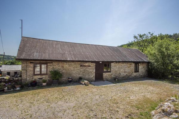 Na zdjęciu widoczny jest obiekt The Hay Barn Brendon Hills położony w mieście Upton.