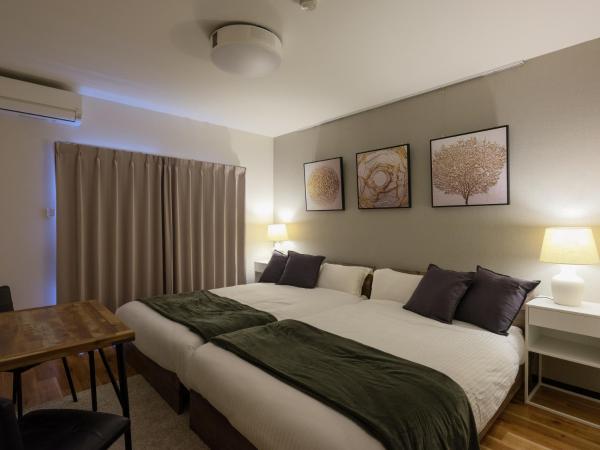 Na fotografii je vidět objekt ガーデン・リラ nacházející se ve městě Ageo.