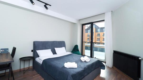 Na zdjęciu widoczny jest obiekt Ski In Out Studio Apartment in New Gudauri położony w mieście Gudauri.