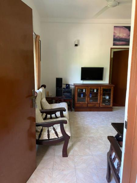 The photo shows the Hanthana Cliffside Apartment located in the city of Kandy.