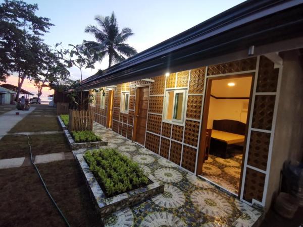 På billedet ses objektet Tambayan Rooms and Cottages by SMS Hospitality beliggende i byen Carmen.