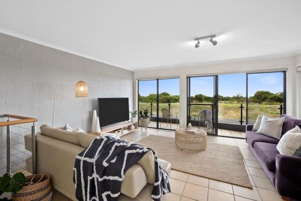 The photo shows the On The Esplanade - Ocean Front Apartment located in the city of Torquay.