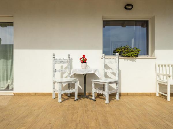 A la foto es mostra l'objecte Casa Giovele situat a la ciutat de Selargius.