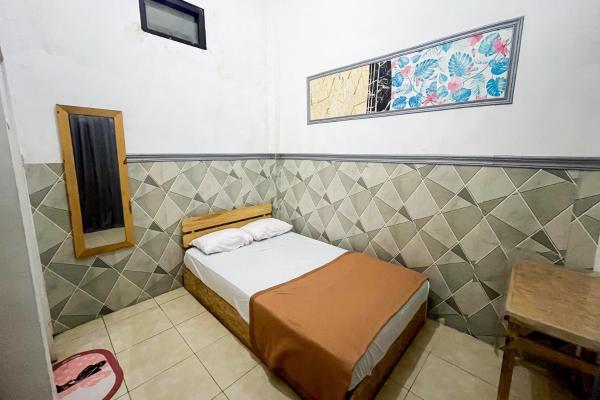 På billedet ses objektet Forzando House Redpartner near Universitas Muhammadiyah Malang beliggende i byen Malang.