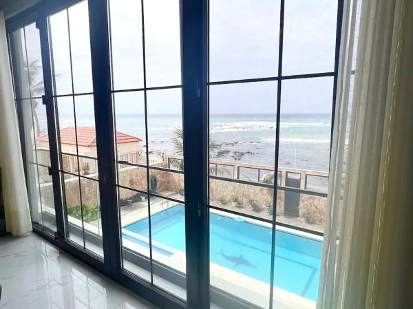 A la foto es mostra l'objecte Incroyables T3 Pieds dans l'eau / Piscine / Plage situat a la ciutat de Dakar.