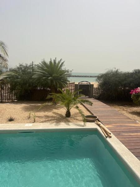 A la foto es mostra l'objecte Villa sénegalaise en bord de mer situat a la ciutat de Sali Nianiaral.