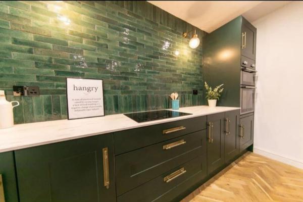 The photo shows the Recently refurbished home. located in the city of Great Singleton.