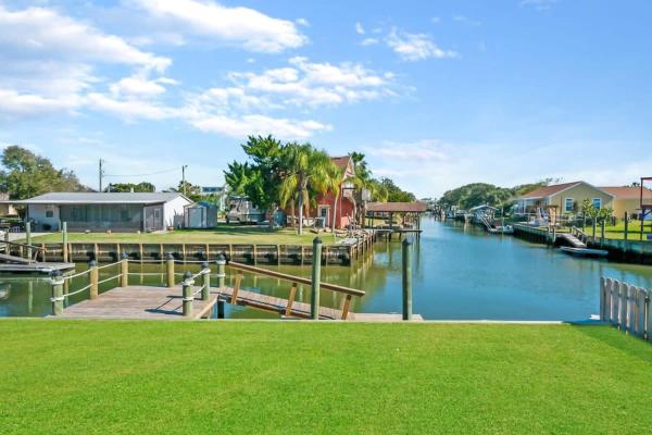 The photo shows the Canal Front Home! Walk to Beach, Porch, Fishing located in the city of St. Augustine.