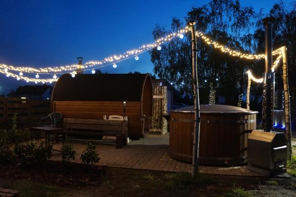 A la foto es mostra l'objecte Drewniany Zakątek z sauną i jacuzzi situat a la ciutat de Rozalin.