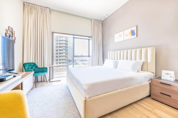 På billedet ses objektet Exclusive Studio Apartment in Park View Tower JVC beliggende i byen Dubai.