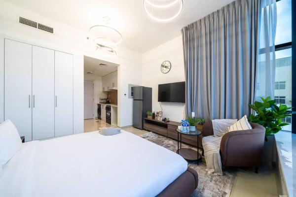 På billedet ses objektet Classic Studio Apartment in JVC - Community View beliggende i byen Dubai.
