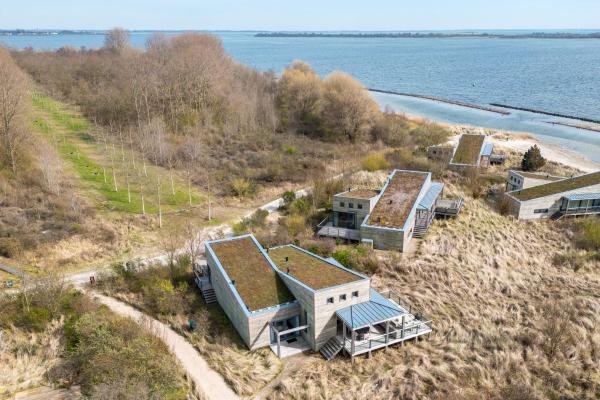 Na zdjęciu widoczny jest obiekt Exclusive Duin Villa - 6p - Direct bij Natuur & Strand - Villa 70 położony w mieście Ouddorp.