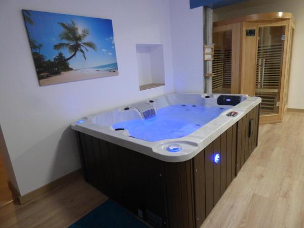 A la foto es mostra l'objecte L'escapade secrète Jacuzzi et Sauna privatif situat a la ciutat de Carvin.