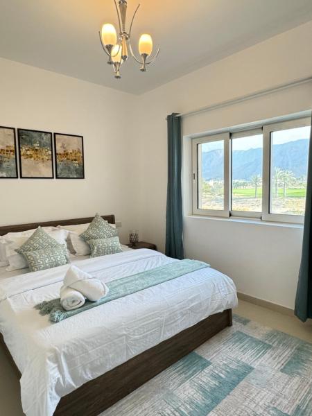 På billedet ses objektet The Vibez Luxury Apartment Sifah beliggende i byen Muscat.