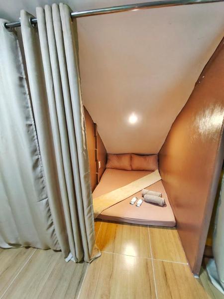 A la foto es mostra l'objecte Golden 8 Airport Hostel - Mactan Cebu situat a la ciutat de Pusok.