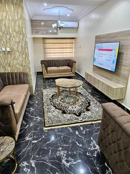 På billedet ses objektet an exquiste 3 bedroom apartment, in a peaceful environment beliggende i byen Abuja.