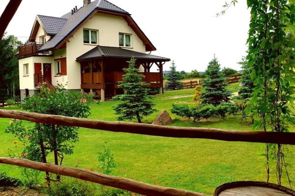 På bildet vises objektet Polna Zagroda - domek do wynajęcia som ligger i byen Kielce.