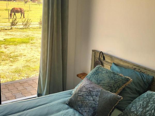 A la foto es mostra l'objecte Maison d'hôtes au sein d'une écurie situat a la ciutat de Plan-dʼOrgon.
