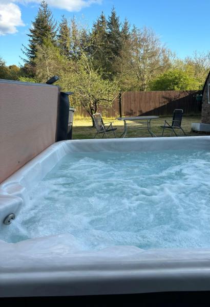 A la foto es mostra l'objecte Odea Hot tub Holiday Cottage situat a la ciutat de Terreglestown.