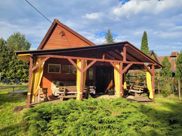 A la foto es mostra l'objecte Brązowy Domek - Tleń, Bory Tucholskie situat a la ciutat de Tleń.