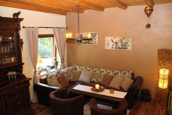 A la foto es mostra l'objecte Ferienhaus am Waldesrand situat a la ciutat de Hatten.