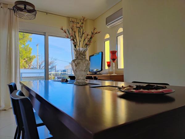 A la foto es mostra l'objecte Finikas Vacation Villa Artemida situat a la ciutat de Artemida.