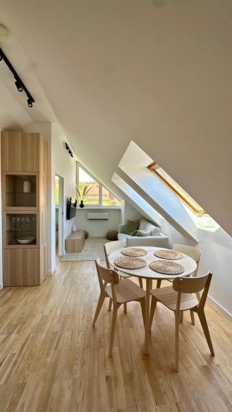 A la foto es mostra l'objecte Nida Oasis Apartment situat a la ciutat de Nida.
