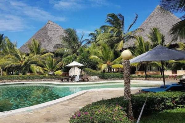 A la foto es mostra l'objecte Tembo 2 Beach cottage, with Pool & Spa situat a la ciutat de Malindi.