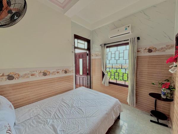 На фото показан объект Thu Trang Homestay Cu Lao Cham, расположенный в городе Cù Lao Chàm.
