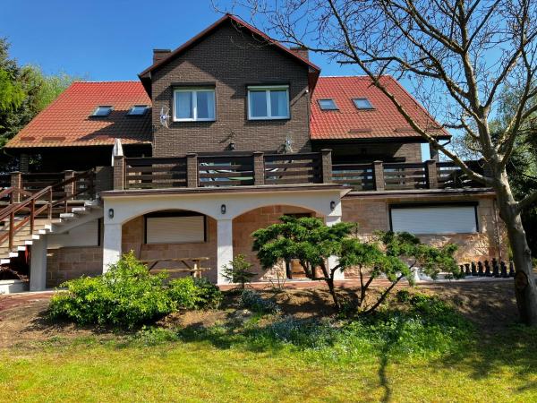Na zdjęciu widoczny jest obiekt Insko Home & Sauna położony w mieście Podlipce.