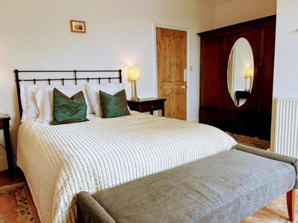 A la foto es mostra l'objecte Large Sunny King-Size En-Suite situat a la ciutat de Ore.