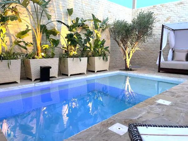 写真にはTagadirt市にあるMagnifique villa avec piscine chaufféeが写っています。
