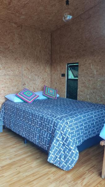 A la foto es mostra l'objecte cabaña madera situat a la ciutat de Guarne.